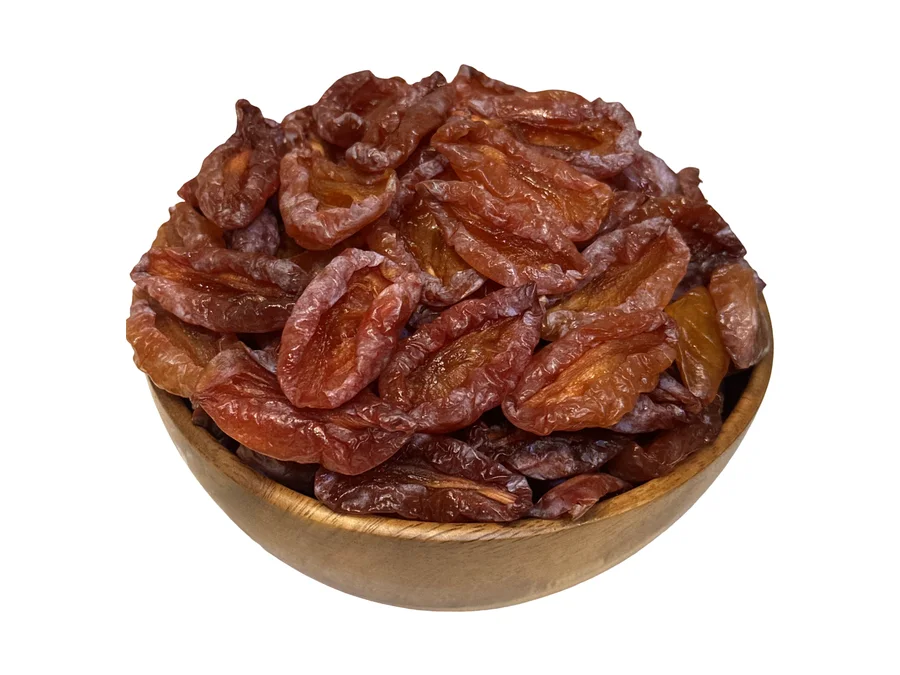Dried Victoria plum, halved